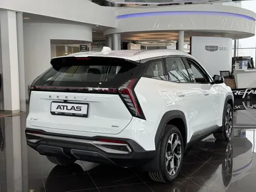 Купить Geely Atlas, II Белый 2.0 AT (200 л.с.) 4WD от 3070990 ₽. в Саратове